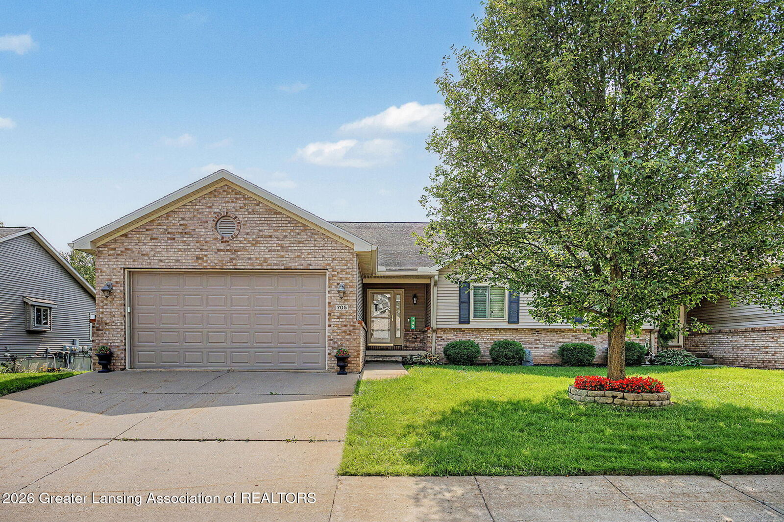 Property Photo:  705 Treetop Trail  MI 48813 