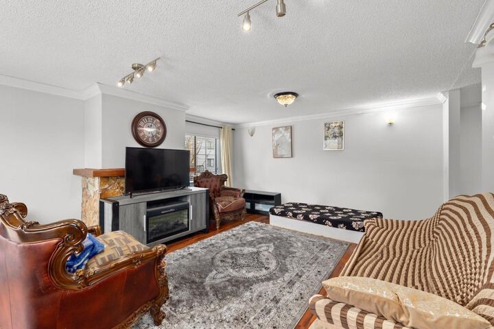 Property Photo:  7119 133 Street 205  BC V3W 7Z6 