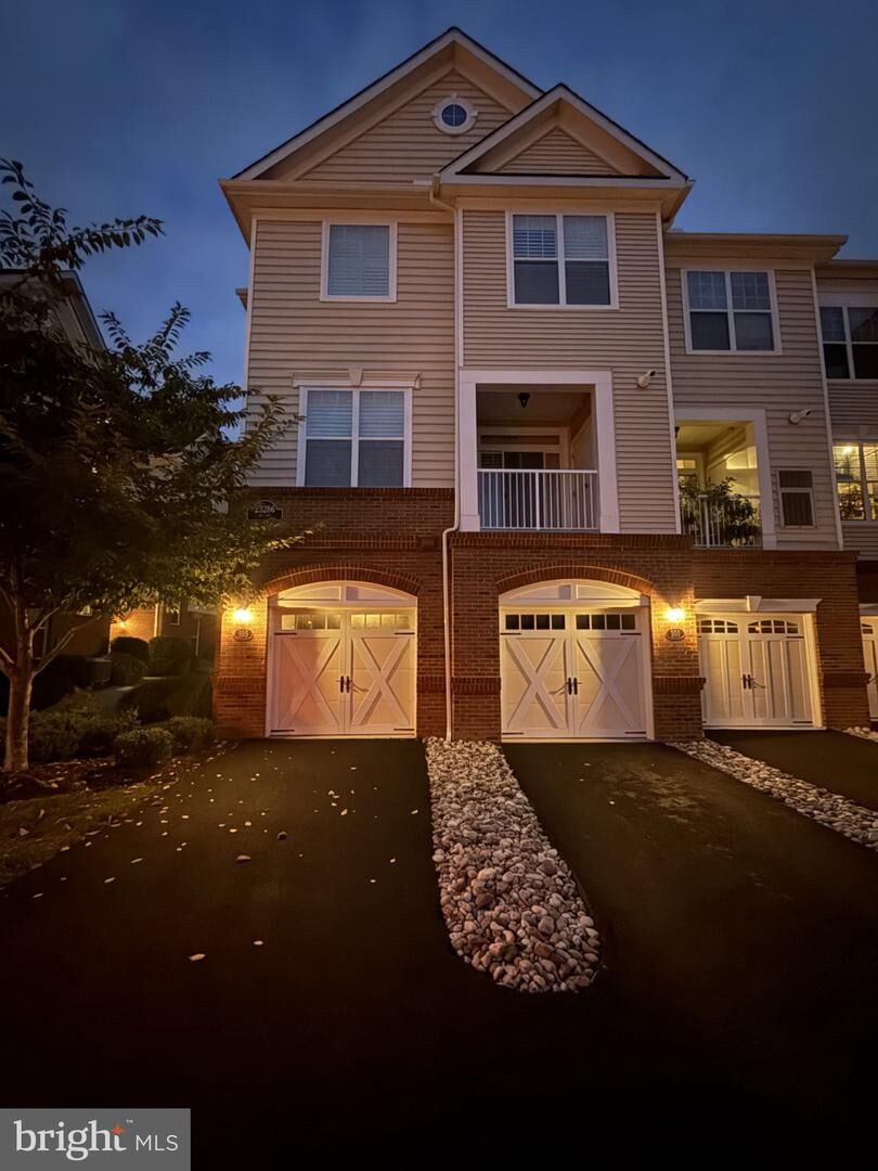 Property Photo:  23286 Southdown Manor Terrace 105  VA 20148 