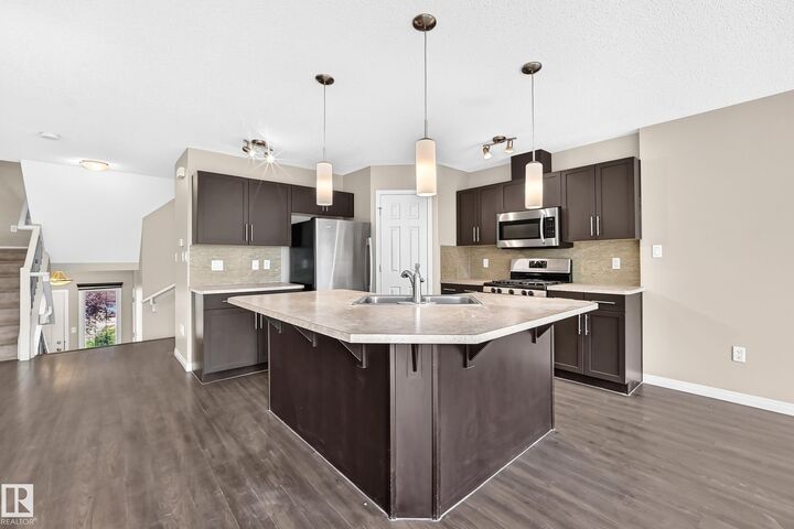 Property Photo:  1941 Chapman Road SW  AB T6W 0Y7 