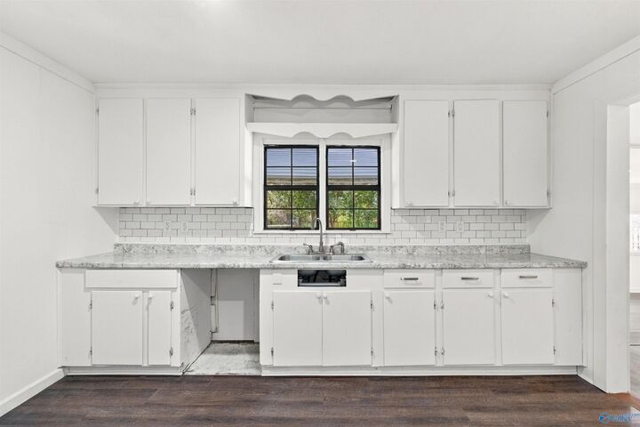 Property Photo: 606 8th Avenue SW AL 35954