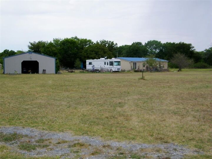 Property Photo:  8079 County Road 1460  OK 74820 