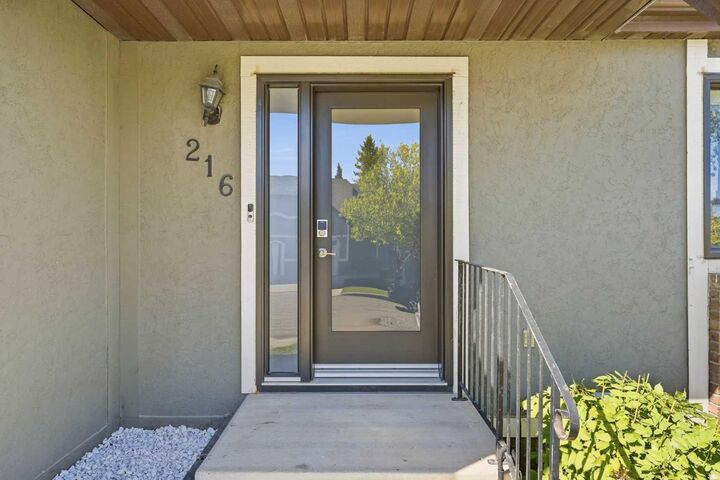 Property Photo:  216 Coach Side Road SW  AB T3H 2T3 