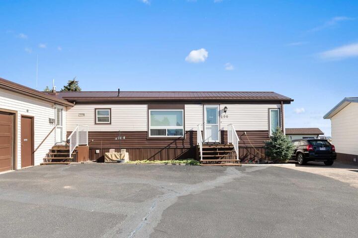 Property Photo:  195 Fairchild Street SW  AB T1A 7Z6 