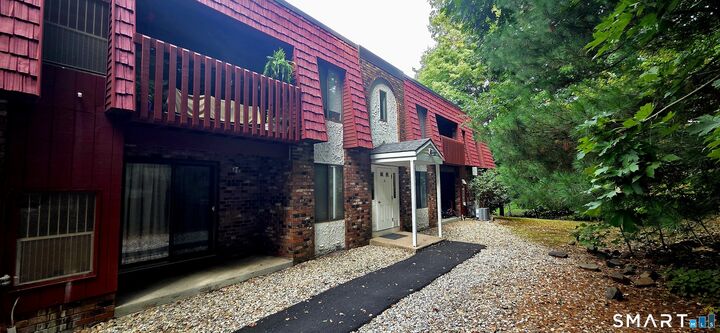 Property Photo: 10 Woodsedge Drive 4B CT 06111