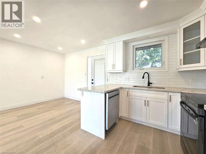 Property Photo:  107 Stirling Macgregor Drive Main  ON N1S 4R3 