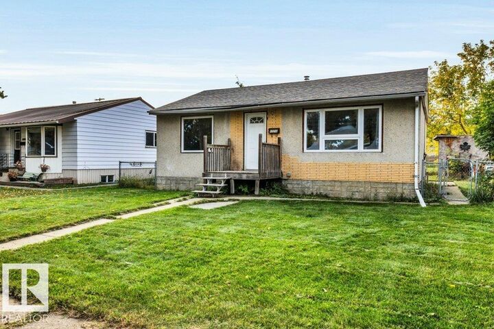 Property Photo:  12210 49 Street NW  AB T5W 3A8 
