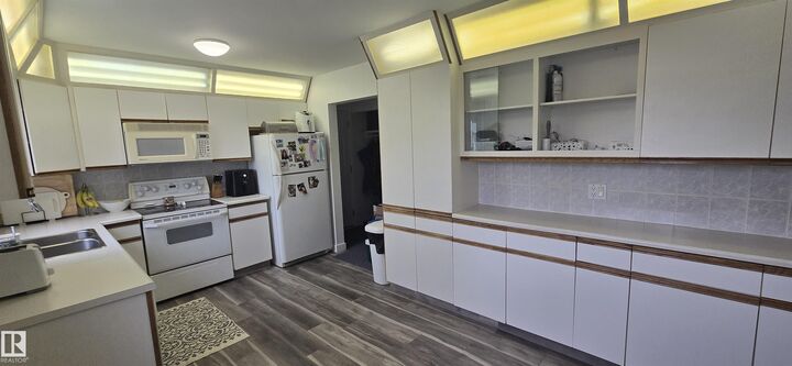 Property Photo:  5822 51 Street  AB T9C 1H9 
