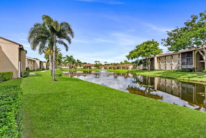 Property Photo:  722 Sunny Pine Way F1  FL 33415 