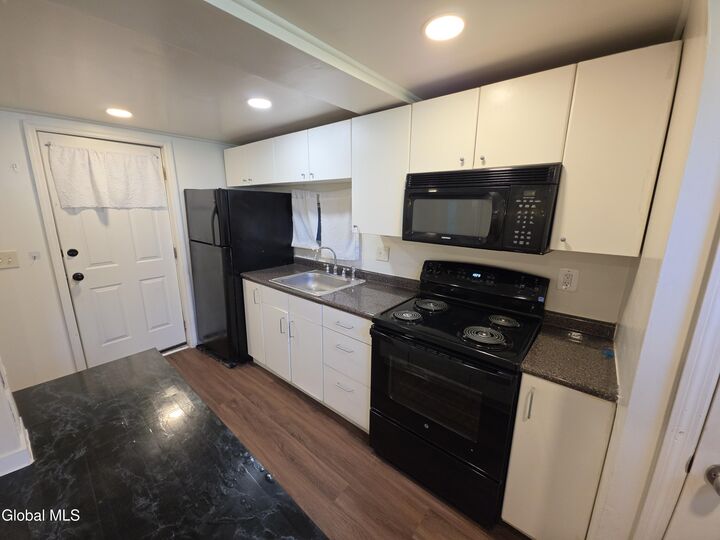 Property Photo:  11 Elm Street Basement  NY 12180 