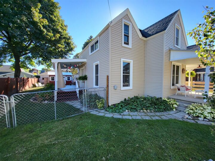 Property Photo:  108 W Upright Street  MI 49720-1323 