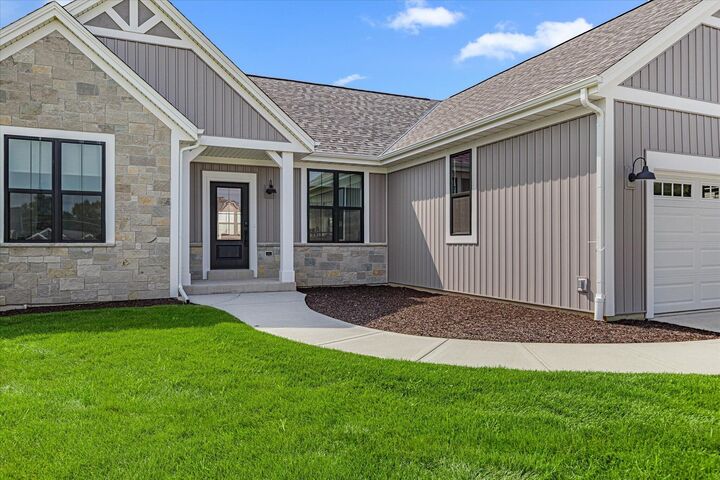 Property Photo:  W251n2413 Valleyview Cir  WI 53072 