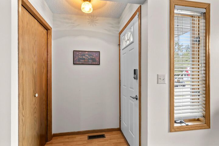 Property Photo:  420 Village Court  MN 55008 