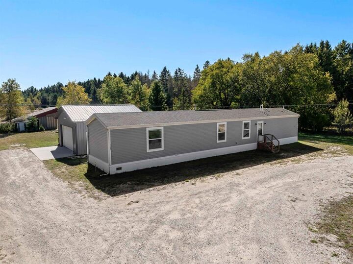 Property Photo:  11261 Maple Road  MI 49617 
