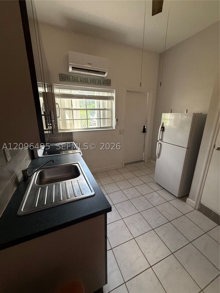 Property Photo:  1105 NE 119th St A  FL 33161 