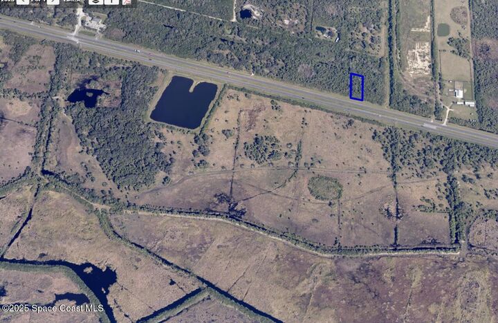 Property Photo:  0 W State Road 520 Lot #25  FL 32926 