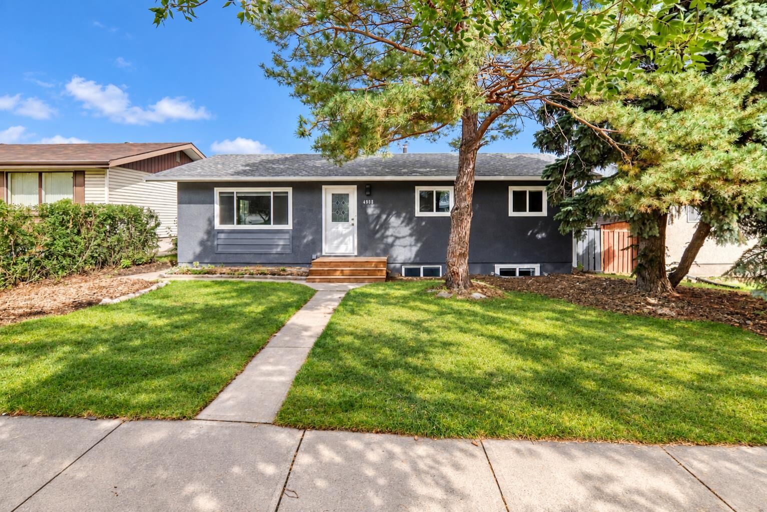 Property Photo:  4908 Marlborough Drive NE  AB T2A 2Z6 