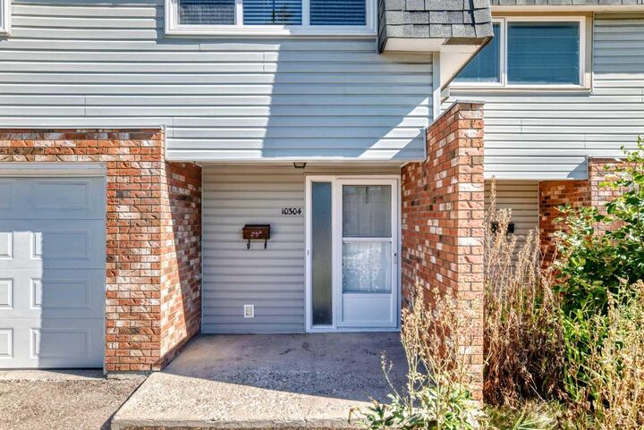 Property Photo: 10304 Braeside Drive SW AB T2W 1B4