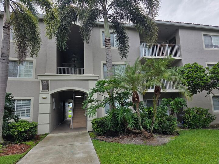Property Photo:  5055 Wiles Road 207  FL 33073 