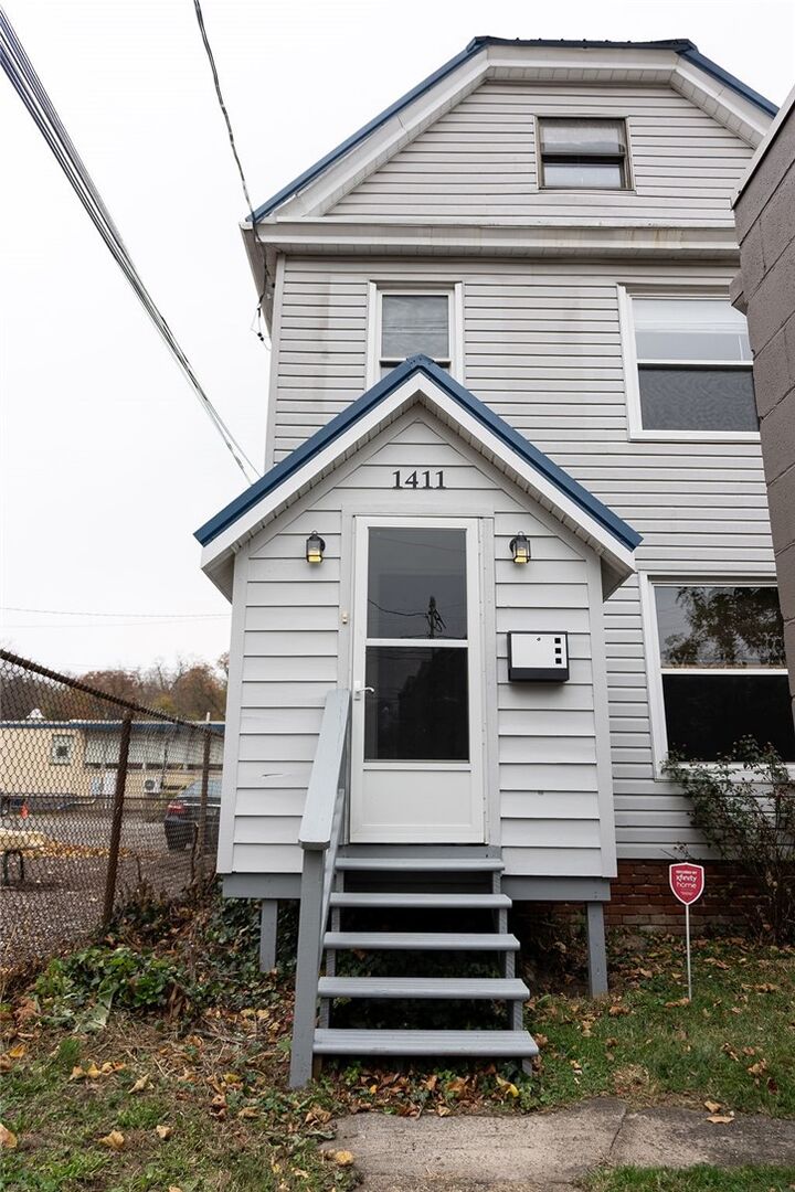 Property Photo:  1411-1413 Pittsburgh Street  PA 15024 