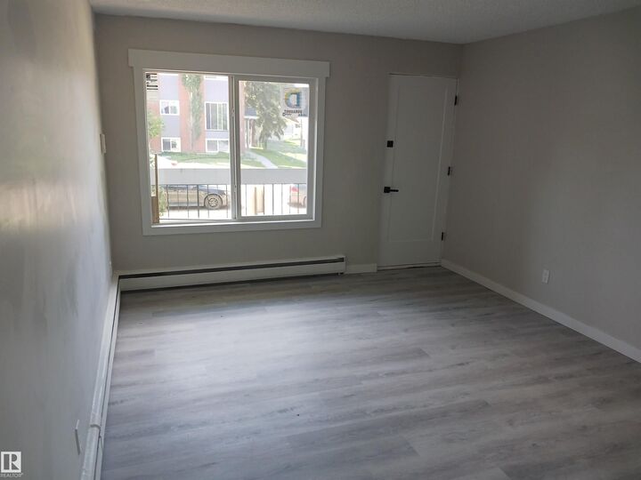 Property Photo:  10045 154 Street NW 2  AB T5P 2H1 