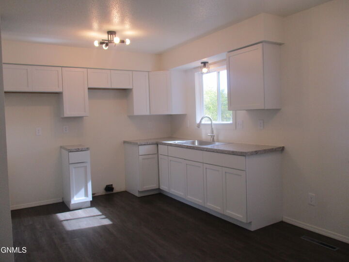 Property Photo:  1723 30th Street W  ND 58801 
