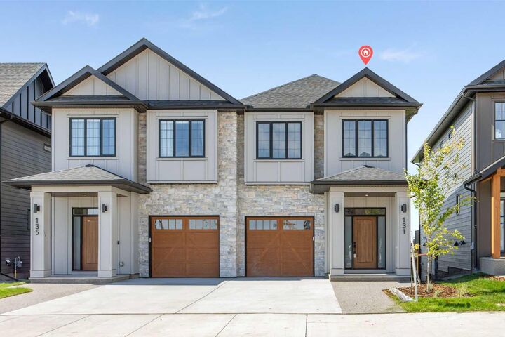 Property Photo:  131 Greenwich Drive NW  AB T3B 6K7 