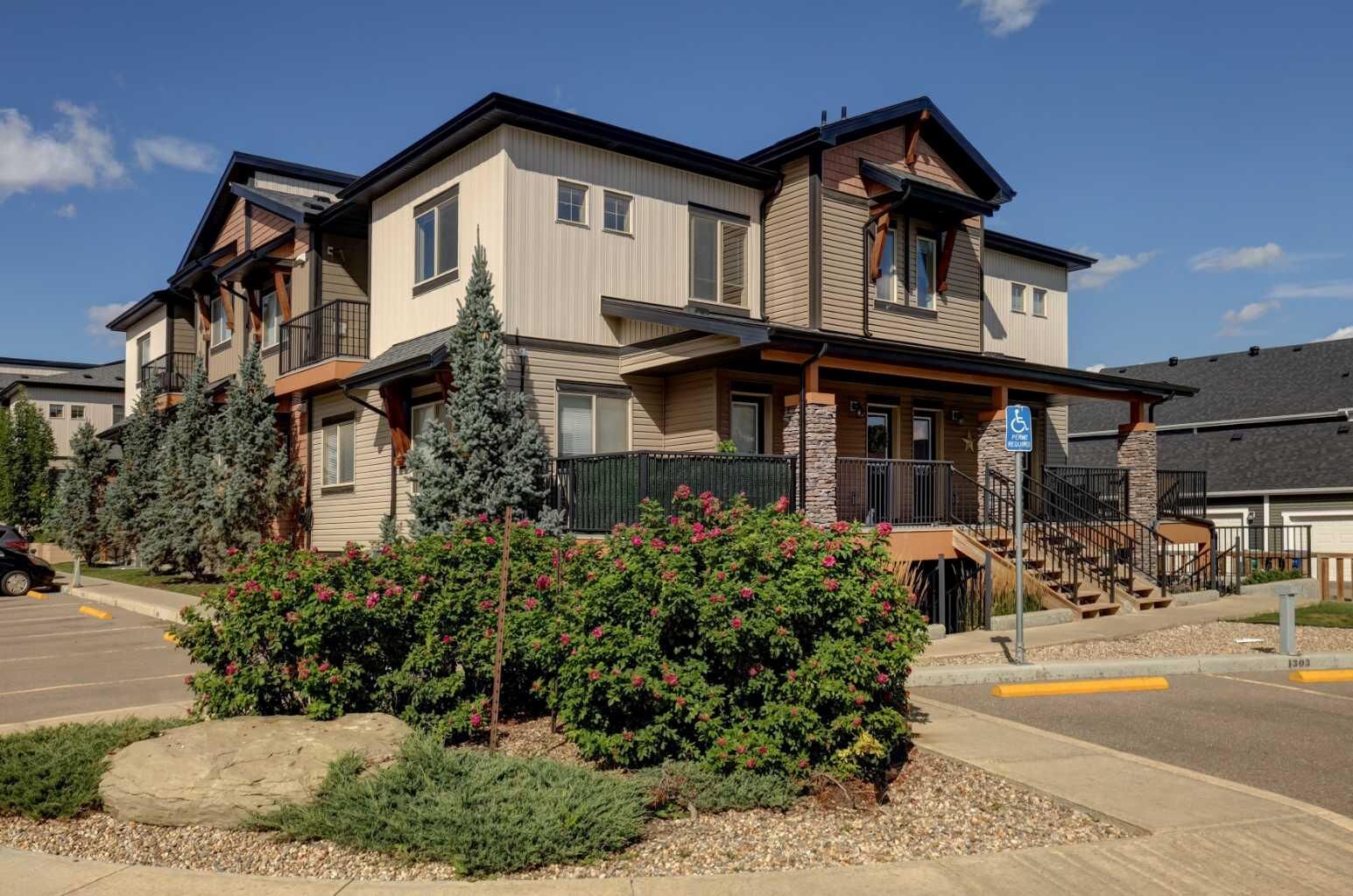 Property Photo: 2461 Baysprings Link SW 1304 AB T4B 4C6