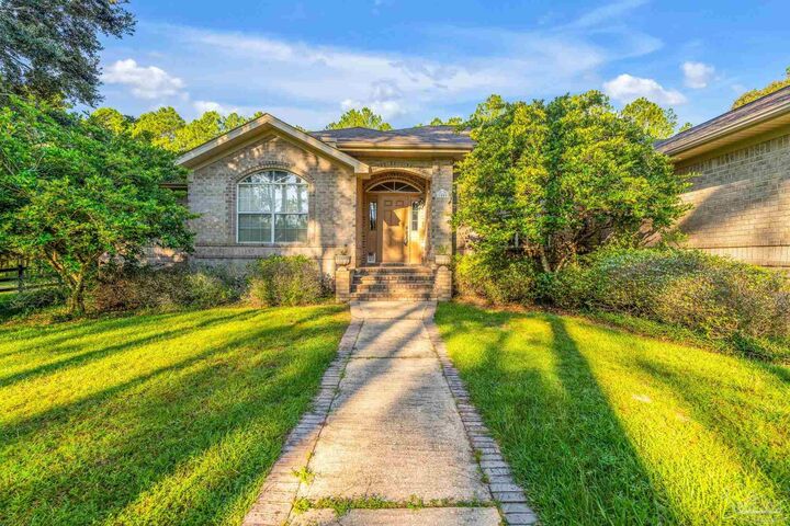 Property Photo:  2400 Renfroe Rd  FL 32571 