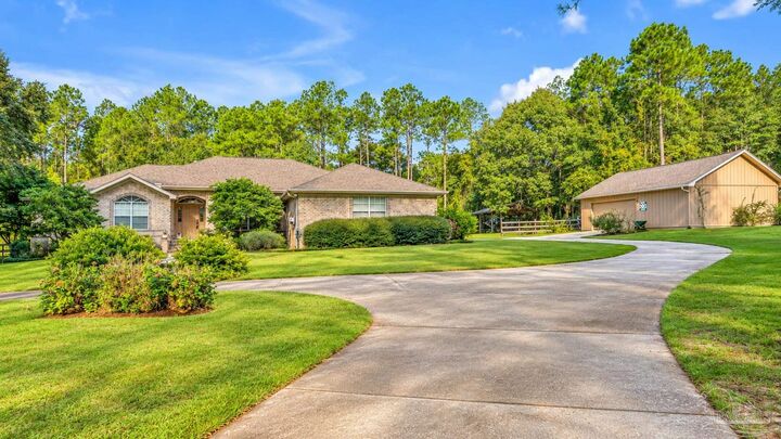 Property Photo:  2400 Renfroe Rd  FL 32571 