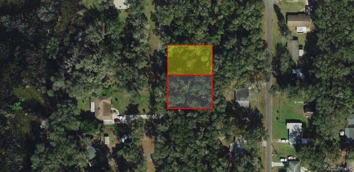 Property Photo: 661 N Woodlake Avenue FL 34453