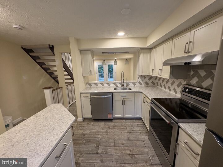 Property Photo:  13809 Palmer House Way 33-244  MD 20904 