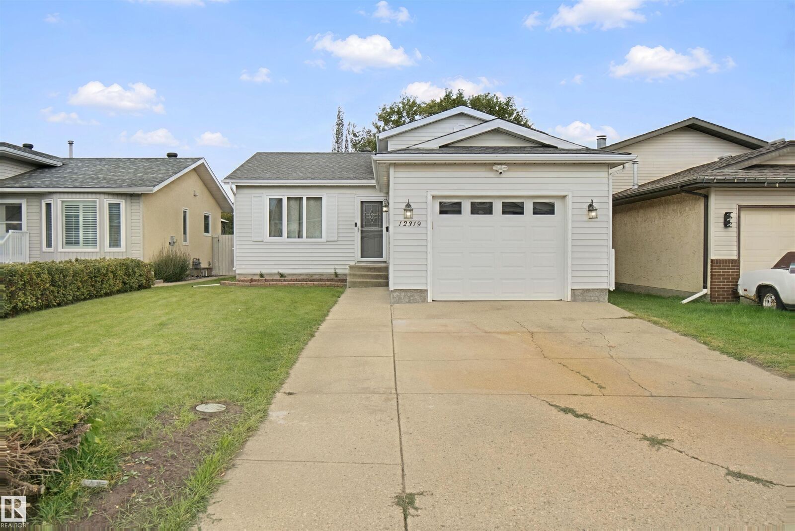 Property Photo: 12319 47 Street NW AB T5W 5E5