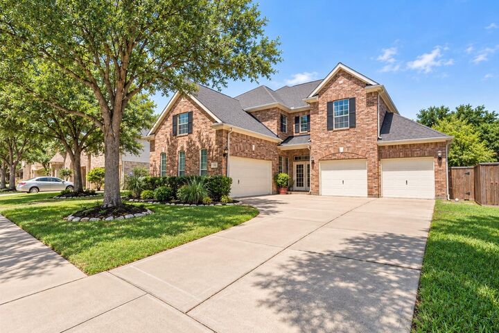 Property Photo: 26418 Cottage Cypress Lane TX 77433