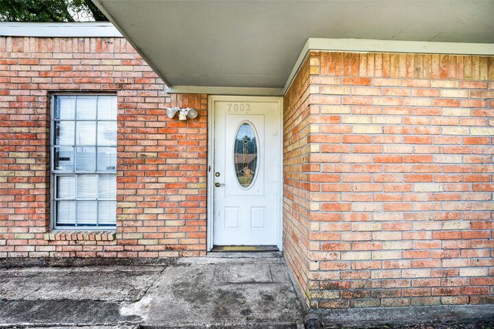 Property Photo:  7003 Sandswept Lane  TX 77086 