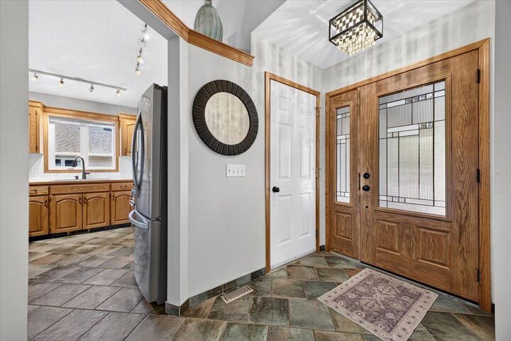 Property Photo:  5 Sunset Crescent  AB T1S 1M6 