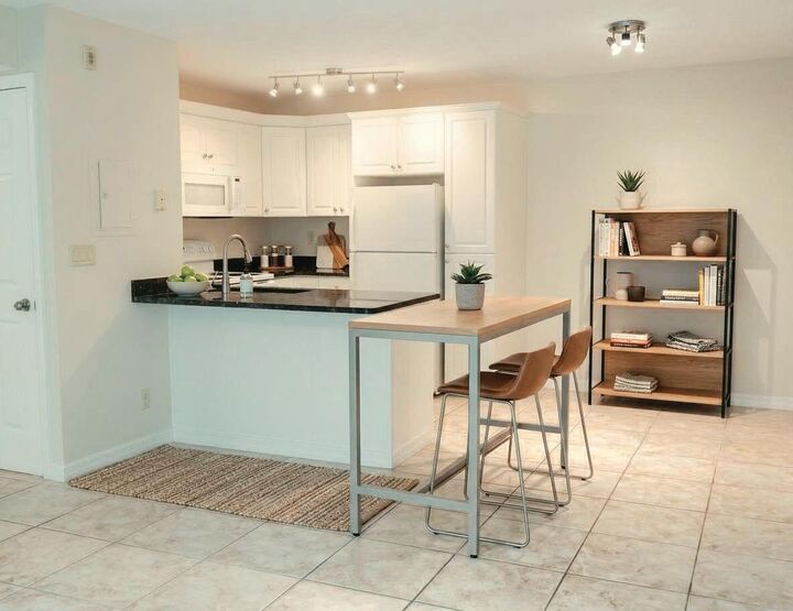 Property Photo:  631 Lyons Road 12103  FL 33063 