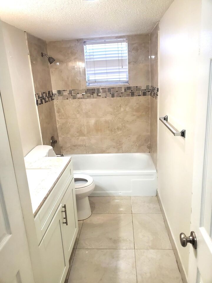 Property Photo:  410 NW 68th Avenue 119  FL 33317 