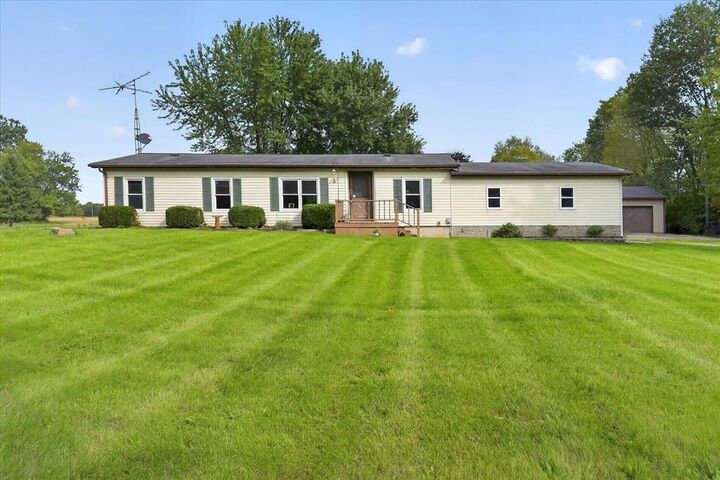 Property Photo:  12225 Hogan Road  MI 49236 