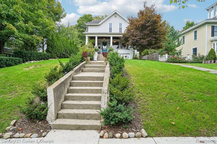 Property Photo:  319 E Commerce Street  MI 48381 