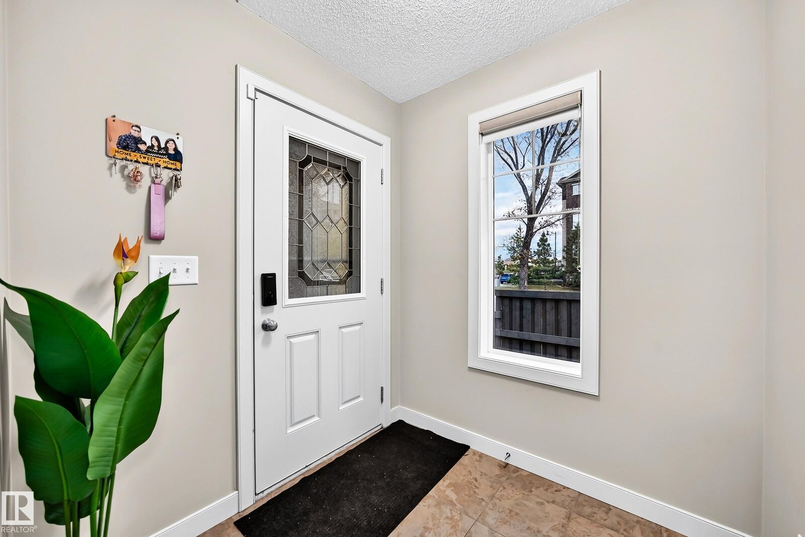 Property Photo:  1673 Cunningham Way SW  AB T6W 0W5 