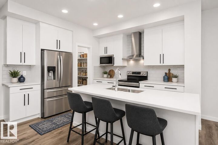 Property Photo:  17228 5 Street NW  AB T5Y 6G4 
