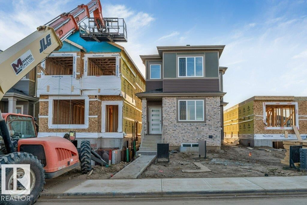 Property Photo:  8416 226 Street NW  AB T5T 7Y8 