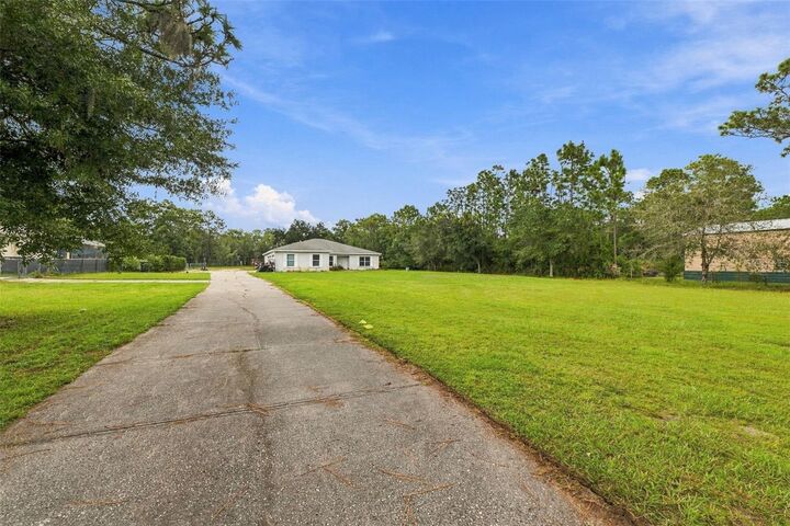 Property Photo:  7405 Miracle Lane  FL 33556 