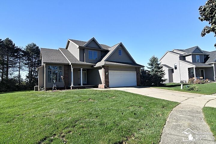Property Photo:  108 Raisin Circle  MI 48131 