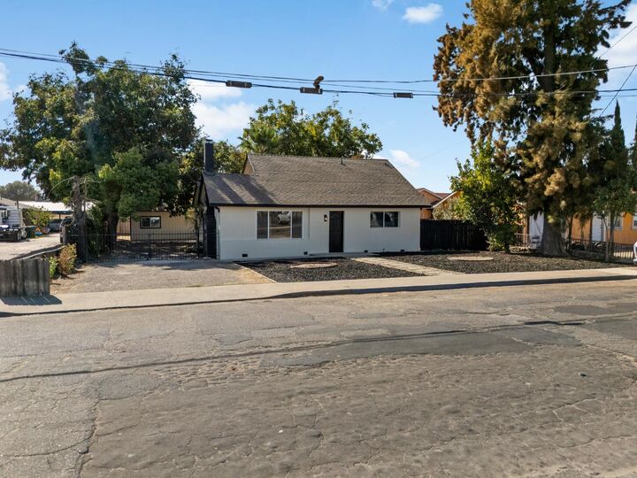 Property Photo:  332 Hinkley Avenue  CA 95361 