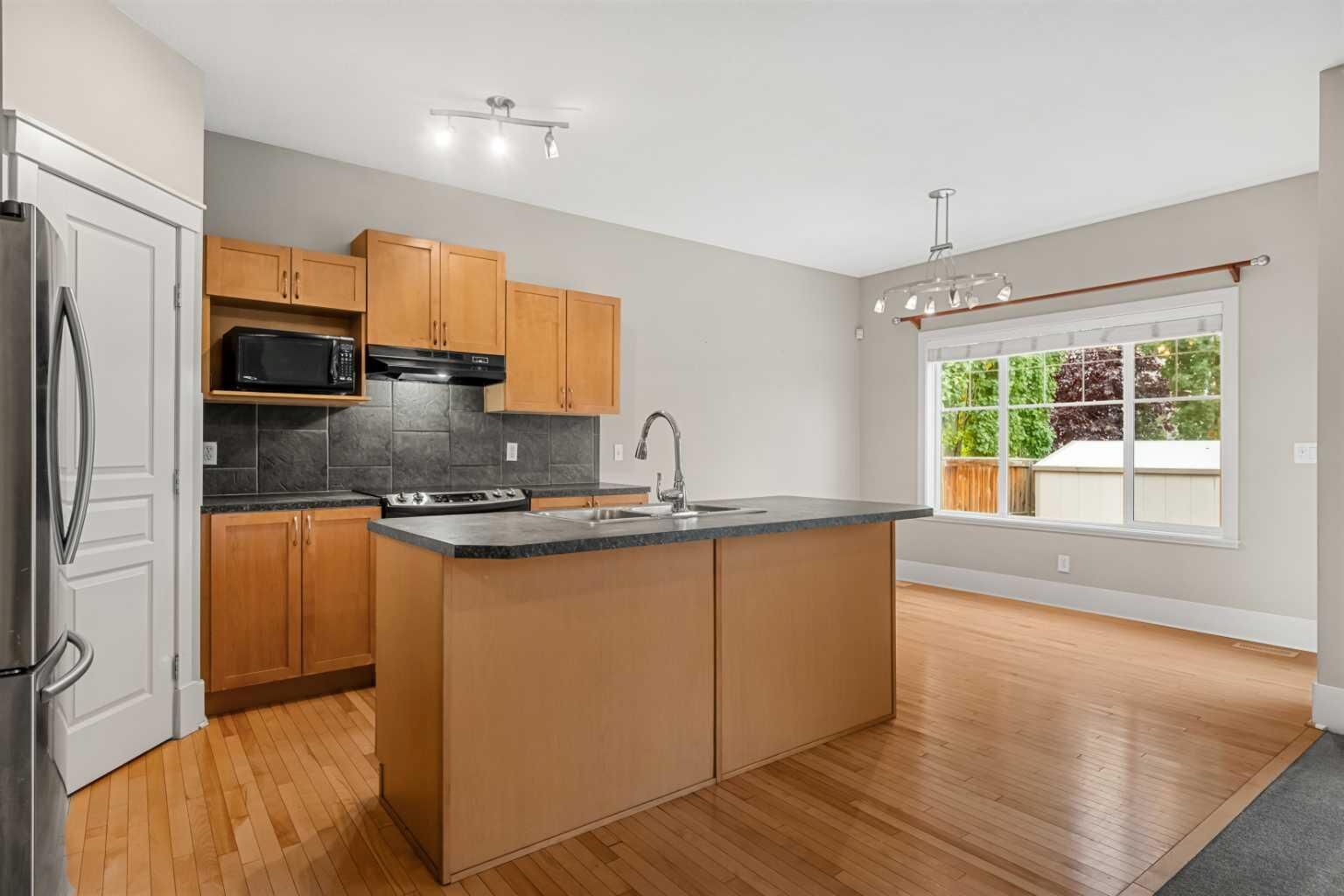 Property Photo:  177 Cougartown Circle SW  AB T3H 0A3 