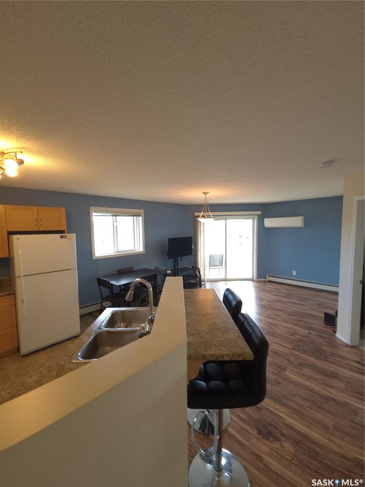 Property Photo:  303 Lowe Road 418  SK S7S 1P2 