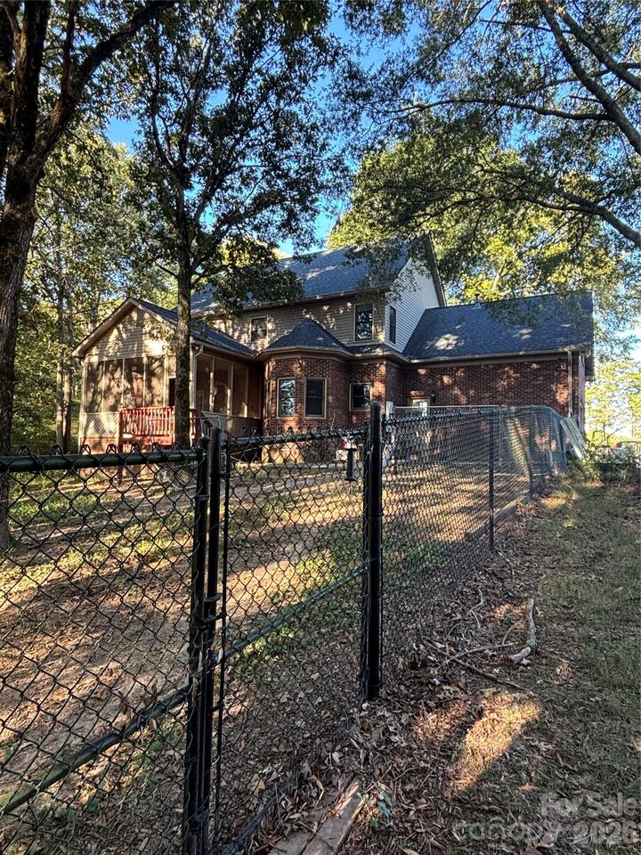 Property Photo:  6000-6010 River Run Drive  NC 28103 