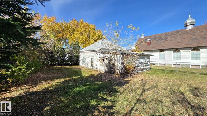 Property Photo:  5521 49 Street  AB T9C 1G5 